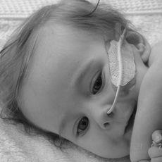 Black and white image of infant close up