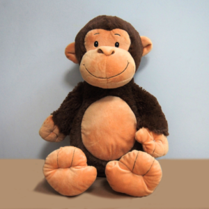 Image shows light and dark brown monkey soft toy.