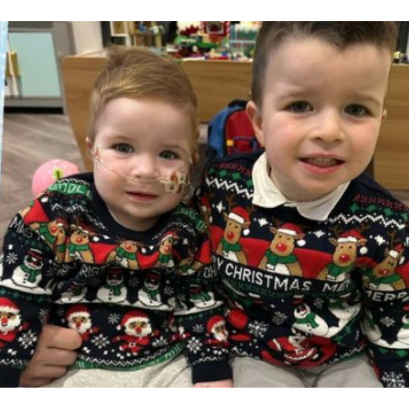 Two boys with Christmas Jumpers