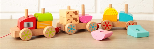 wooden toy train and two carriages