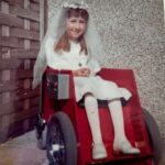 Clare First Holy Communion in an early wheelchair