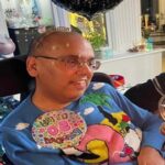 Vik with 50th birhday balloon